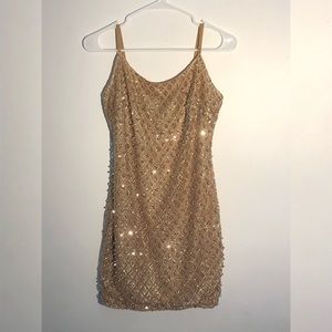 Fashion Nova Roxie Dress in Gold